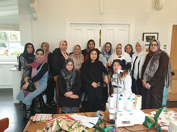 NZ businesses pitch in to help former refugees sew for Christmas